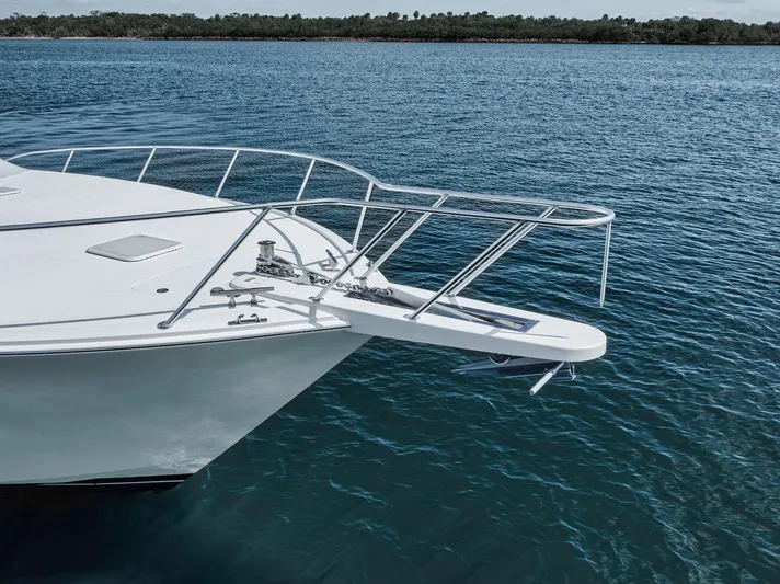 Aegis Yacht Photos Pics 2009 Viking 54 Convertible yacht bow on calm water.