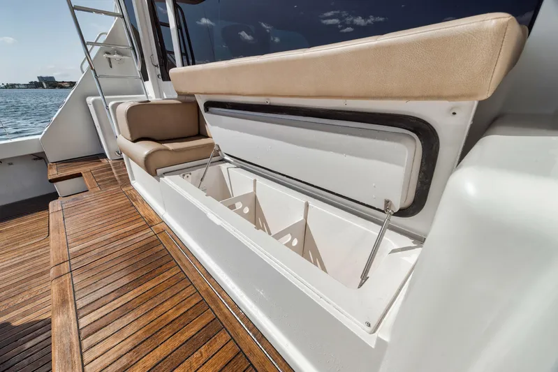 Aegis Yacht Photos Pics 2009 Viking 54 Convertible yacht with open storage compartment on teak deck.