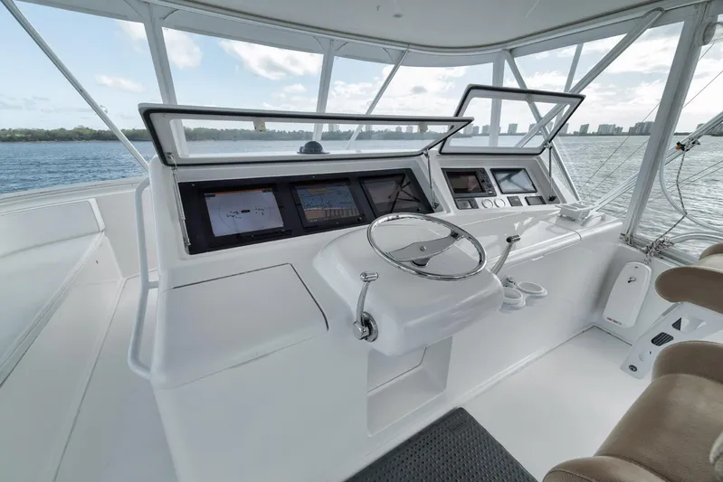 Aegis Yacht Photos Pics 2009 Viking 54 Convertible yacht helm with modern navigation equipment and ocean view.