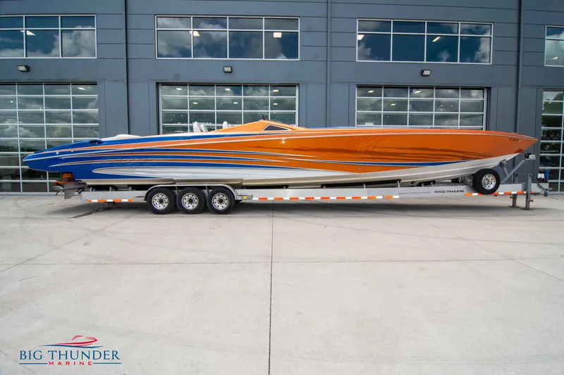  Yacht Photos Pics 2015 Nor-Tech 527 Super Vee boat on a trailer in front of a building.