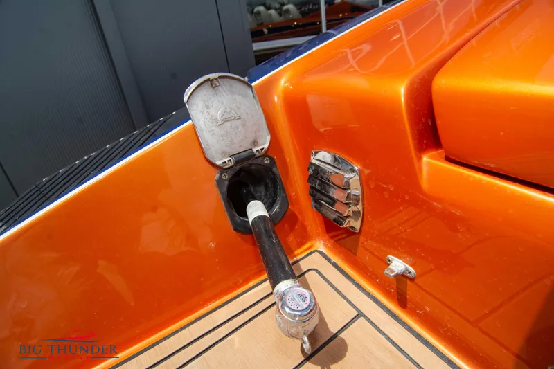  Yacht Photos Pics Close-up of 2015 Nor-Tech 527 Super Vee fuel filler cap and hose.