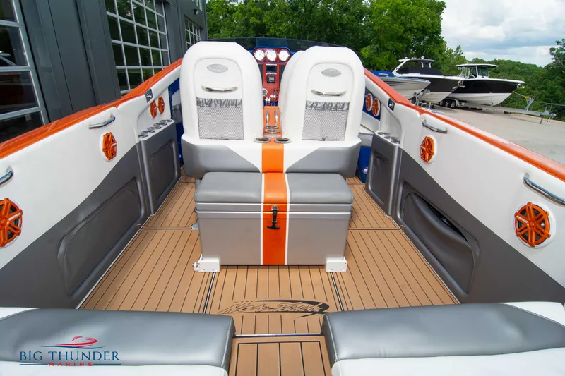 Yacht Photos Pics 2015 Nor-Tech 527 Super Vee boat interior with orange and white seating.