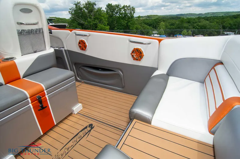  Yacht Photos Pics 2015 Nor-Tech 527 Super Vee boat interior with orange and gray seating.