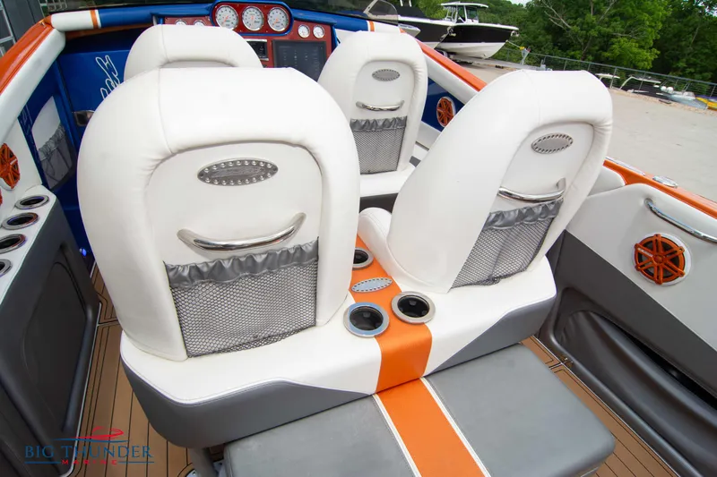  Yacht Photos Pics 2015 Nor-Tech 527 Super Vee boat interior with white and orange seating.