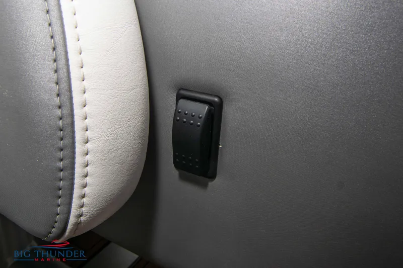  Yacht Photos Pics Close-up of 2015 Nor-Tech 527 Super Vee interior switch and upholstery.