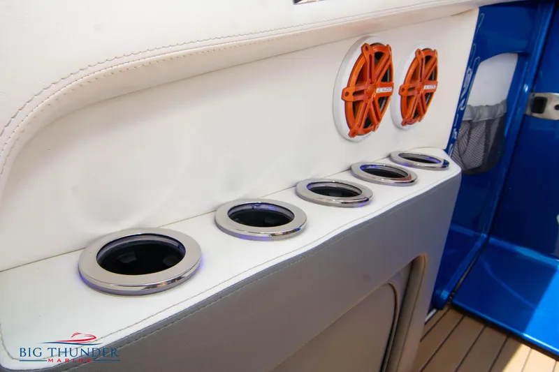  Yacht Photos Pics 2015 Nor-Tech 527 Super Vee interior with cup holders and speakers.