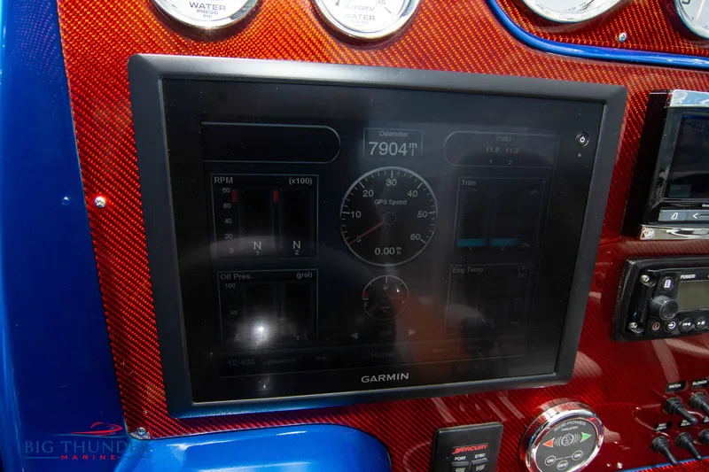  Yacht Photos Pics 2015 Nor-Tech 527 Super Vee dashboard with Garmin display and gauges.