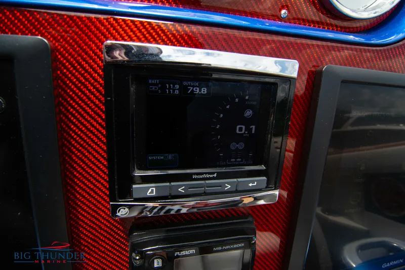  Yacht Photos Pics Close-up of 2015 Nor-Tech 527 Super Vee dashboard with navigation and control systems.