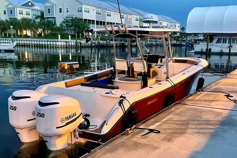  Yacht Photos Pics 2010 Pursuit C 280 Center Console boat docked with twin Yamaha 250 engines.