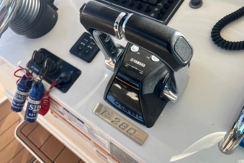 Yacht Photos Pics Close-up of 2010 Pursuit C 280 Center Console controls with Yamaha throttle.