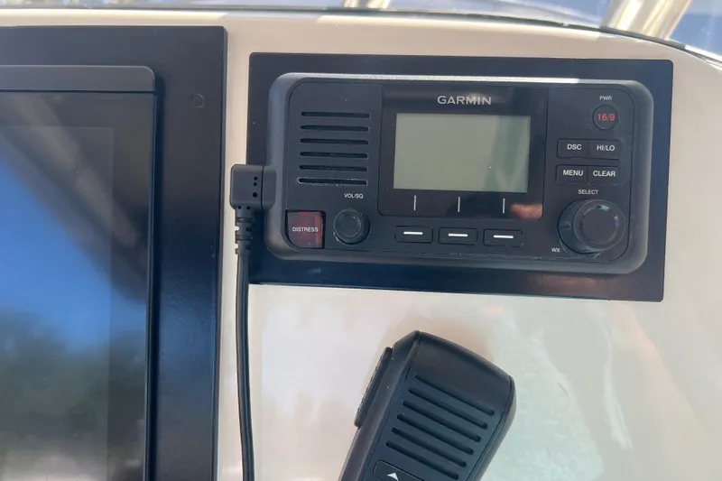  Yacht Photos Pics Garmin marine radio on 2010 Pursuit C 280 Center Console boat dashboard.