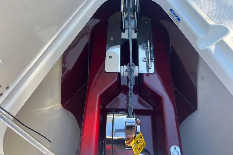  Yacht Photos Pics Anchor chain mechanism on 2010 Pursuit C 280 Center Console boat.