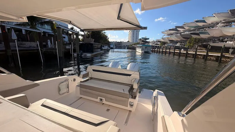  Yacht Photos Pics Interior view of Tiara Sport 34 LS yacht, 2023 model, by the water.