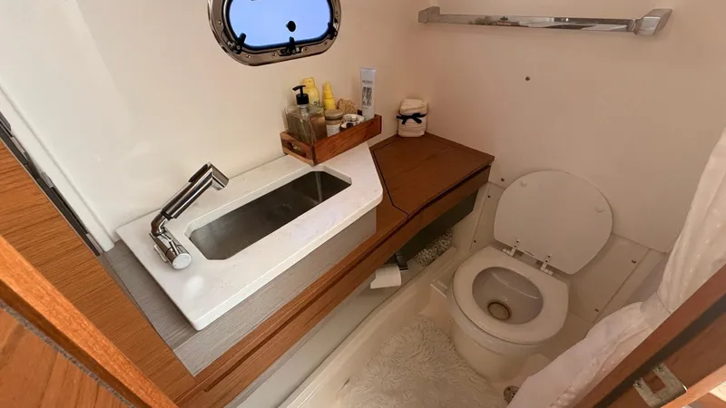  Yacht Photos Pics Luxurious bathroom in Tiara Sport 34 LS boat, 2023 model.