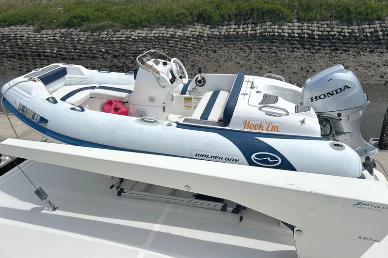 El Sueno Yacht Photos Pics Inflatable boat with Honda motor on Grand Alaskan 60 Pilothouse, 1998 model.