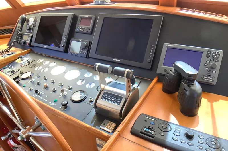 El Sueno Yacht Photos Pics Pilothouse of 1998 Grand Alaskan 60, featuring navigation controls and electronic displays.