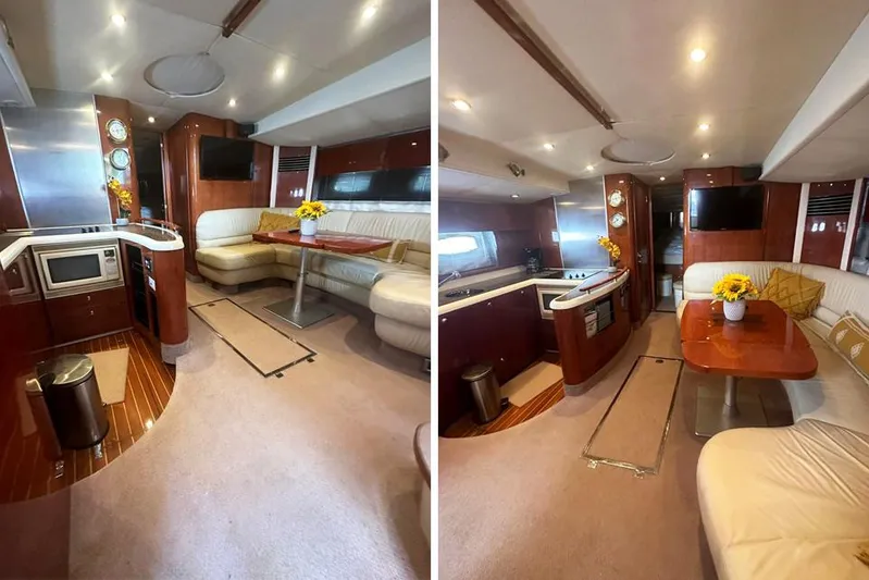 Big D Yacht Photos Pics Interior of 2004 Fairline Targa 52 yacht with modern kitchen and cozy seating area.