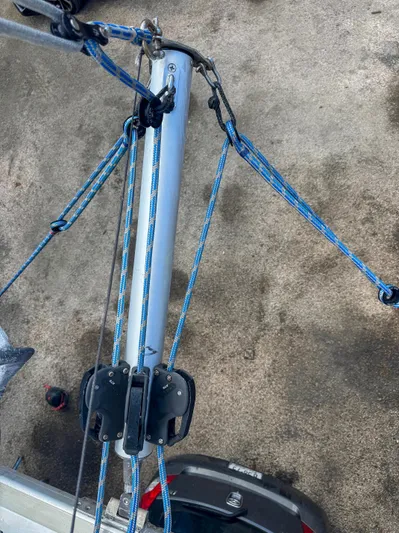 Dao And Out Yacht Photos Pics Rigging system of a 2011 Lagoon 400 catamaran with blue ropes and pulleys.