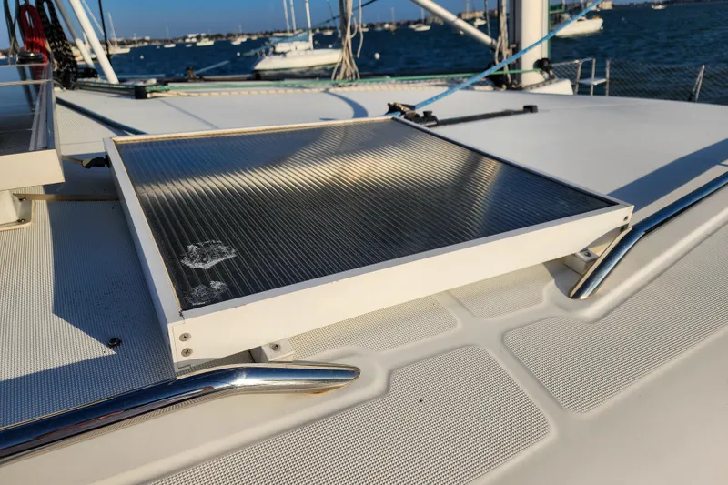 Dao And Out Yacht Photos Pics Solar panel on 2011 Lagoon 400 catamaran deck, with ocean view in background.