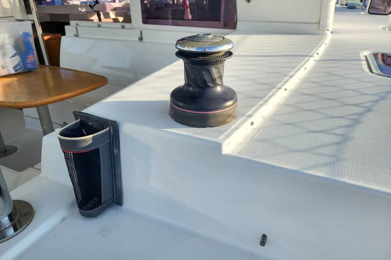 Dao And Out Yacht Photos Pics Deck of 2011 Lagoon 400 catamaran with winch and cup holder.