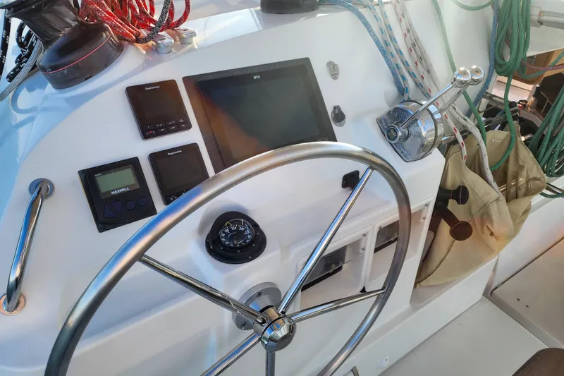 Dao And Out Yacht Photos Pics Steering wheel and controls of a 2011 Lagoon 400 catamaran yacht.