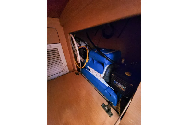 Dao And Out Yacht Photos Pics Interior view of a 2011 Lagoon 400 yacht, showcasing equipment storage.