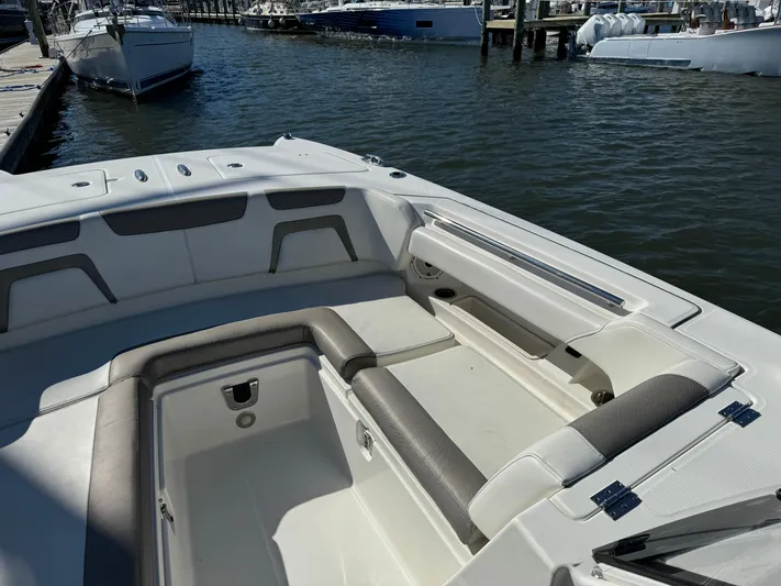 Reel'y Busy Yacht Photos Pics 2020 World Cat 280 DC x boat interior with spacious seating at dock.
