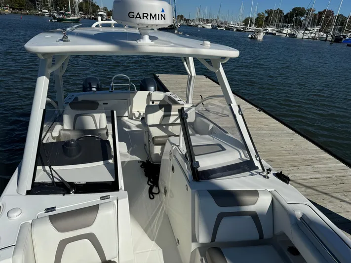 Reel'y Busy Yacht Photos Pics 2020 World Cat 280 DC x boat docked at marina with Garmin equipment.