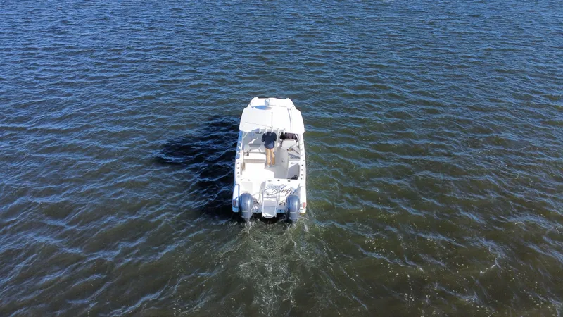 Reel'y Busy Yacht Photos Pics Aerial view of 2020 World Cat 280 DC x boat on open water.