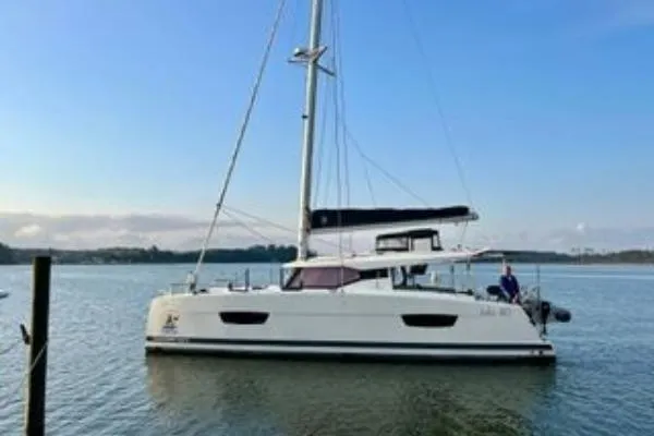 Amihan Yacht Photos Pics 2023 Fountaine Pajot Isla 40 catamaran sailing on calm waters.