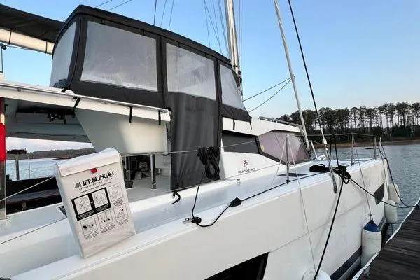Amihan Yacht Photos Pics 2023 Fountaine Pajot Isla 40 catamaran docked, featuring sleek design and modern amenities.