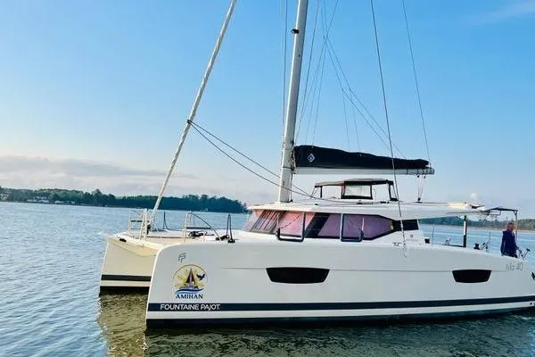 Amihan Yacht Photos Pics 2023 Fountaine Pajot Isla 40 catamaran sailing on calm waters.