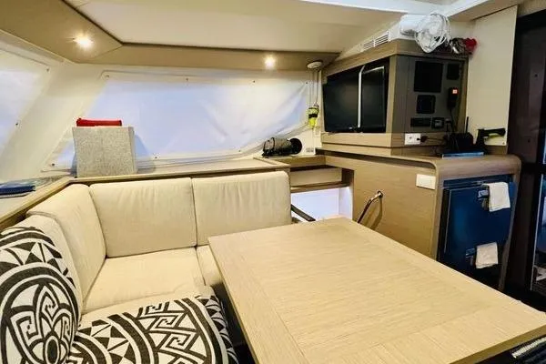 Amihan Yacht Photos Pics Interior of 2023 Fountaine Pajot Isla 40 catamaran with modern seating and entertainment area.