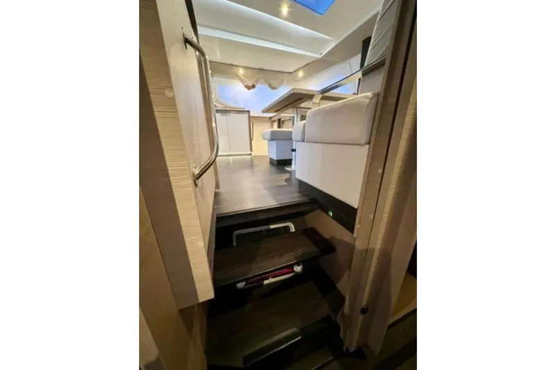 Amihan Yacht Photos Pics Interior view of 2023 Fountaine Pajot Isla 40 catamaran, featuring modern design and comfortable seating.