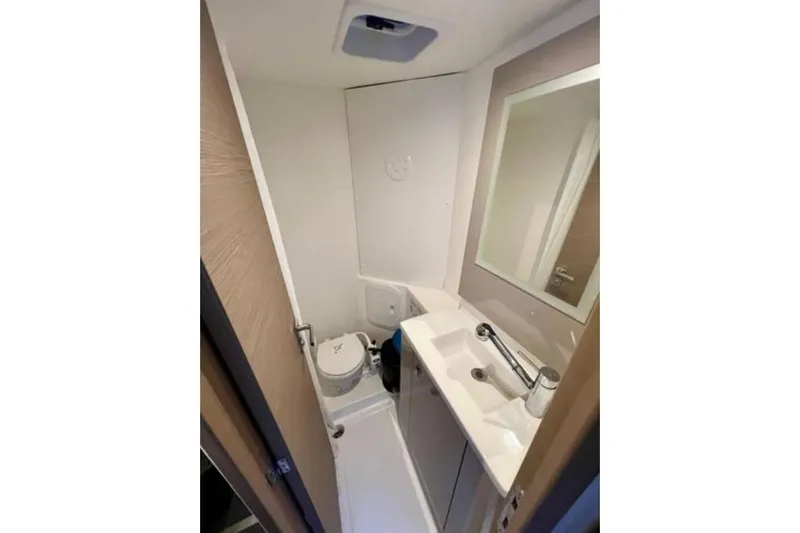 Amihan Yacht Photos Pics 2023 Fountaine Pajot Isla 40 yacht bathroom with modern sink and mirror.