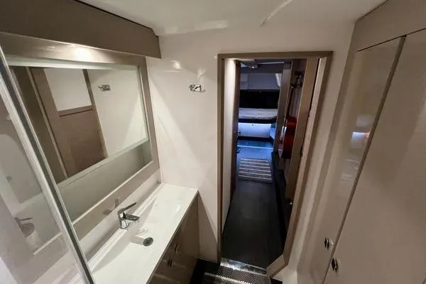 Amihan Yacht Photos Pics Interior of 2023 Fountaine Pajot Isla 40 yacht, featuring a modern bathroom design.