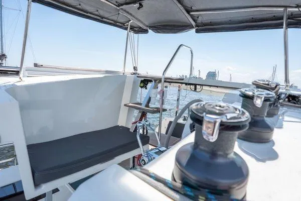 Amihan Yacht Photos Pics 2023 Fountaine Pajot Isla 40 yacht helm station with winches and seating.
