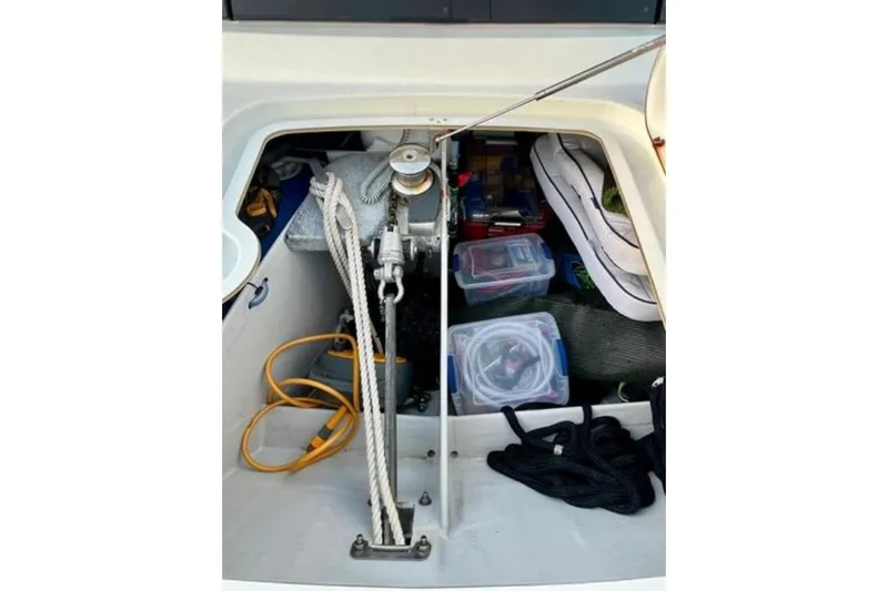 Amihan Yacht Photos Pics Storage compartment of 2023 Fountaine Pajot Isla 40 catamaran with ropes and equipment.