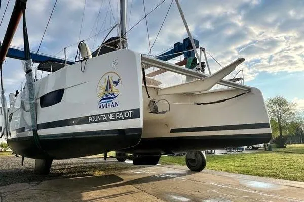 Amihan Yacht Photos Pics 2023 Fountaine Pajot Isla 40 catamaran on land, showcasing sleek design and modern features.