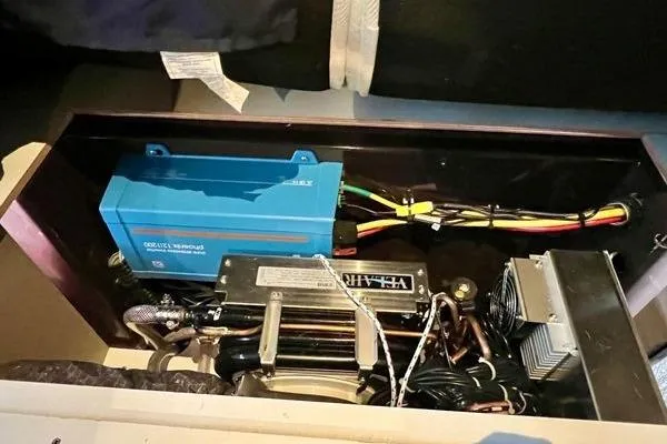 Amihan Yacht Photos Pics Electrical components inside 2023 Fountaine Pajot Isla 40 yacht, featuring wiring and equipment.