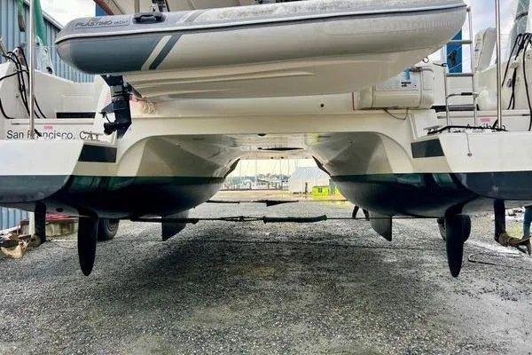 Amihan Yacht Photos Pics 2023 Fountaine Pajot Isla 40 catamaran, rear view, on land with tender boat.