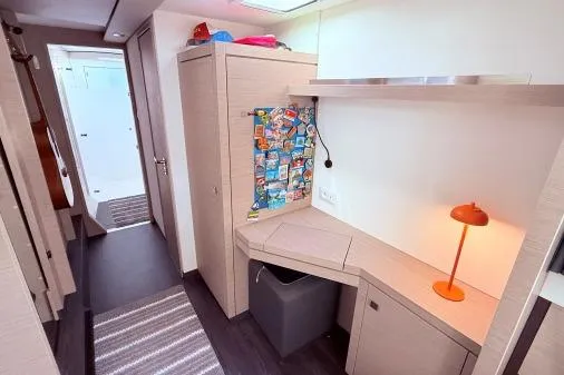 Amihan Yacht Photos Pics Interior of 2023 Fountaine Pajot Isla 40 catamaran with modern desk and vibrant decor.