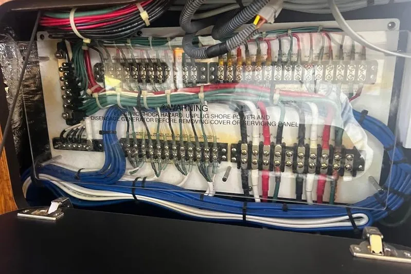  Yacht Photos Pics Electrical panel with colorful wiring in a 2014 Pursuit OS 345 Offshore boat.