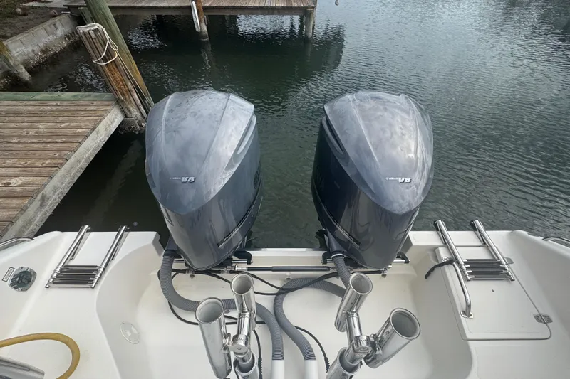  Yacht Photos Pics 2014 Pursuit OS 345 Offshore boat with twin Yamaha V8 outboard engines at dock.
