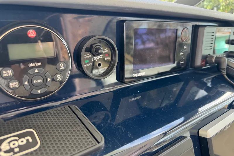  Yacht Photos Pics Dashboard of 2014 Pursuit OS 345 Offshore boat with Clarion and Yamaha controls.