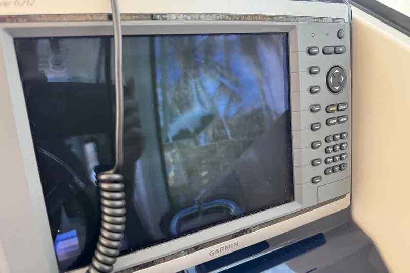  Yacht Photos Pics Garmin marine GPS system on 2014 Pursuit OS 345 Offshore boat dashboard.