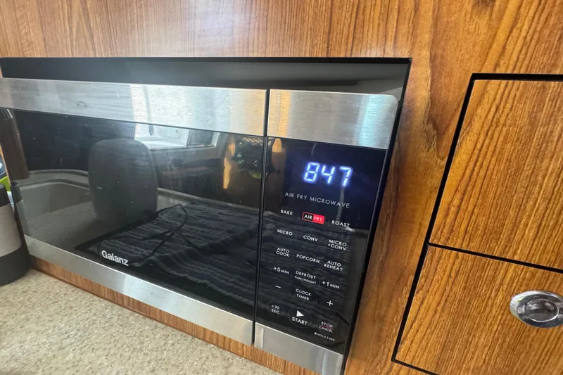  Yacht Photos Pics Galanz air fry microwave in 2014 Pursuit OS 345 Offshore boat kitchen.