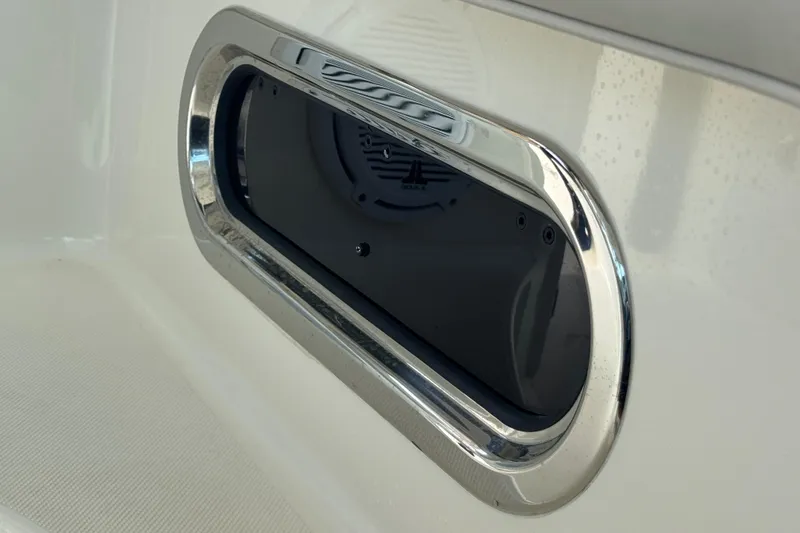  Yacht Photos Pics 2014 Pursuit OS 345 Offshore boat speaker with chrome trim detail.