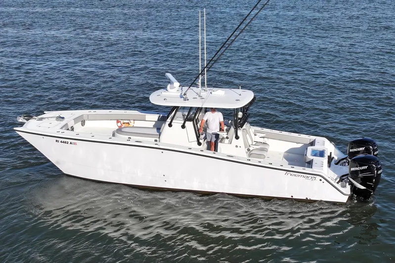  Yacht Photos Pics 2020 Freeman 34VH boat on water with dual Mercury engines.