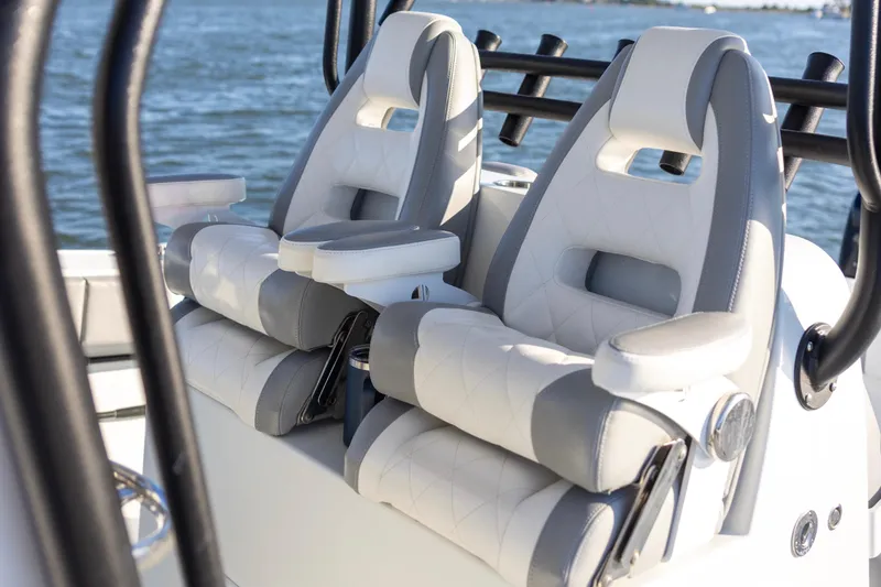  Yacht Photos Pics Luxury seating on a 2020 Freeman 34VH boat with ocean backdrop.
